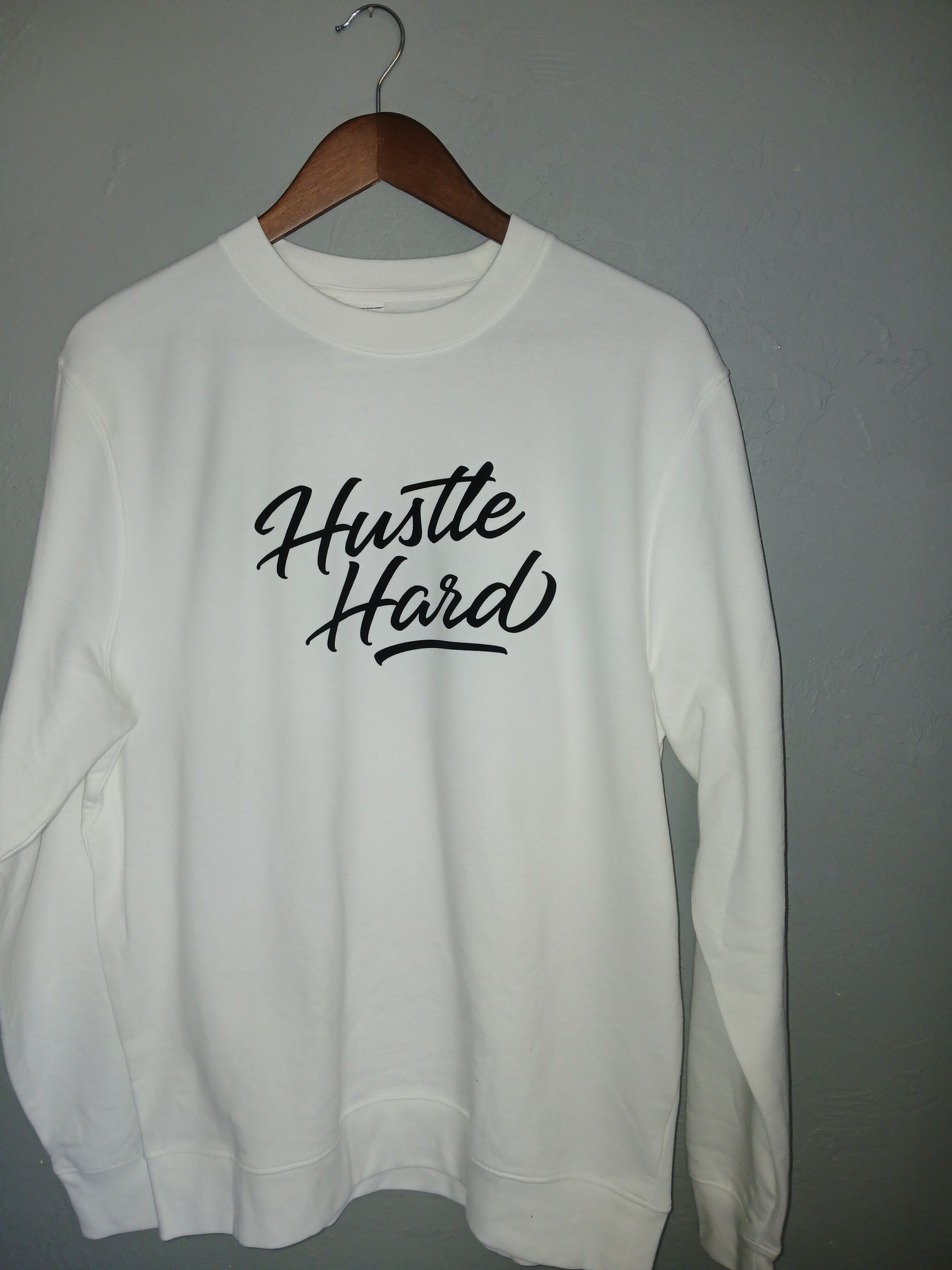 SevenTen LIFE Hustle Hard sweat shirt with bold lettering, casual fit, and comfortable fabric for active wear and workouts.