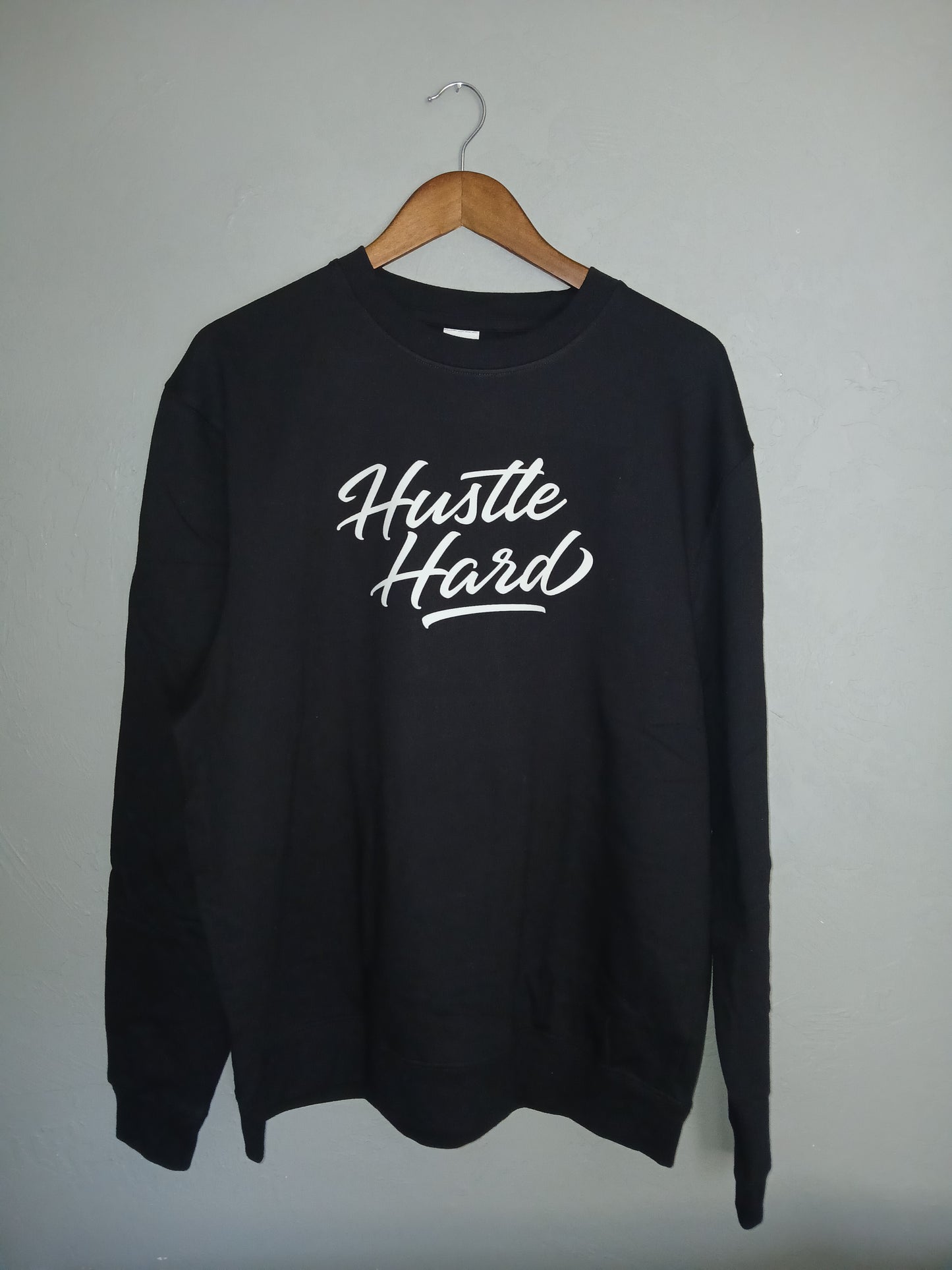 SevenTen LIFE Hustle Hard sweat shirt with bold lettering, comfortable fit, and casual style, perfect for active and relaxed wear.