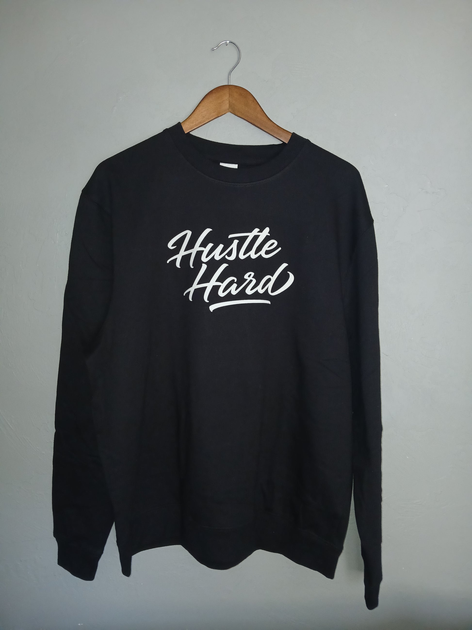 SevenTen LIFE Hustle Hard sweat shirt with bold lettering, comfortable fit, and casual style, perfect for active and relaxed wear.
